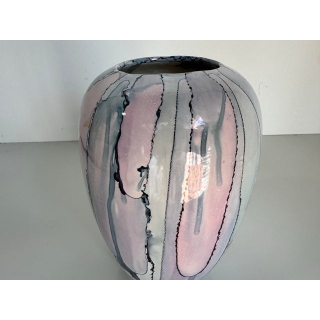 This striking 1989 vintage ceramic vase, signed “Kate”, is a stunning example of handcrafted abstract pottery. Featuring a...