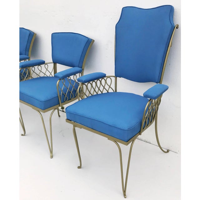 Superb Set of chair by Rene Prou , wrought Iron gold painted Gold , new blue silk fabric. The set is composed of 2 high...