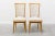 Set of six chairs made from beech wood with gold-tone imitation leatherette upholstered in white skin with gold finish....
