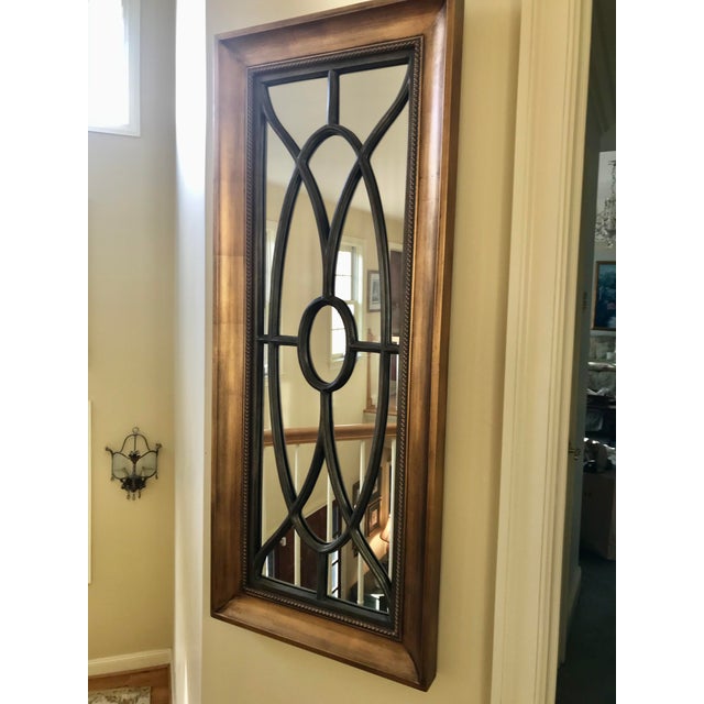 A spectacular and timeless mirror that can be used to create a window of reflected light or a dramatic focal point above a...