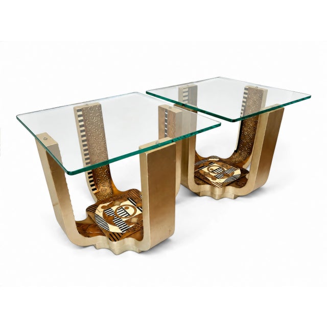 A pair of postmodern, Memphis-style sculptural side tables attributed to Lam Lee Group, featuring glass tops with slightly...