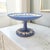 A classic Wedgwood Jasperware pedestal compote executed in the firm’s signature matte blue stoneware with applied cream...