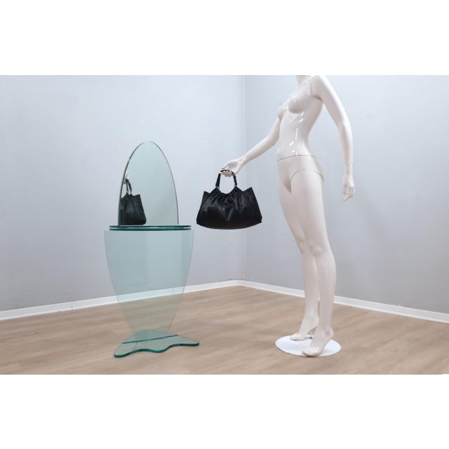 Enhance the beauty of your space with this exclusive rotating vintage vanity mirror produced in Italy during 1990s. Its...