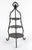 Art Nouveau cast iron three tier display piece with a natural undulating design and slight Gothic influence in the tracery...