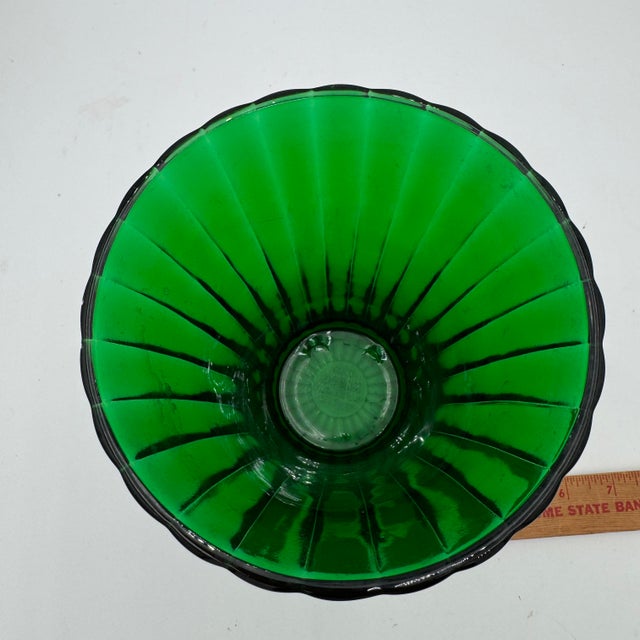 The Napco Style 1161 is a classic fluted trumpet vase, often referred to by collectors as a "bouquet vase" due to its...