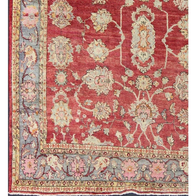 Early 20th Century Antique Turkish Oushak Rug in Red Blue/Gray Border L. Green Yellow & Pink For Sale In Atlanta - Image 6 of 11