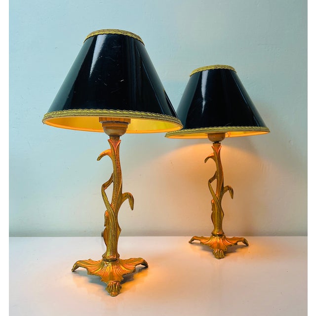 Lovely Art Nouveau style small table lamps from France, presumably 1950s, perhaps earlier. The brass column has the shape...