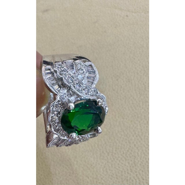 Vintage Approximately 3 Carat Oval Tsavorite & 2.2 Carat Diamond Ring , Platinum 16.4Gm Estate Size 6 Tsavorite of this...