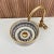 Our Gold Ceramic Sink is stunning addition to elevate your bathroom decor. Handcrafted with meticulous attention to...