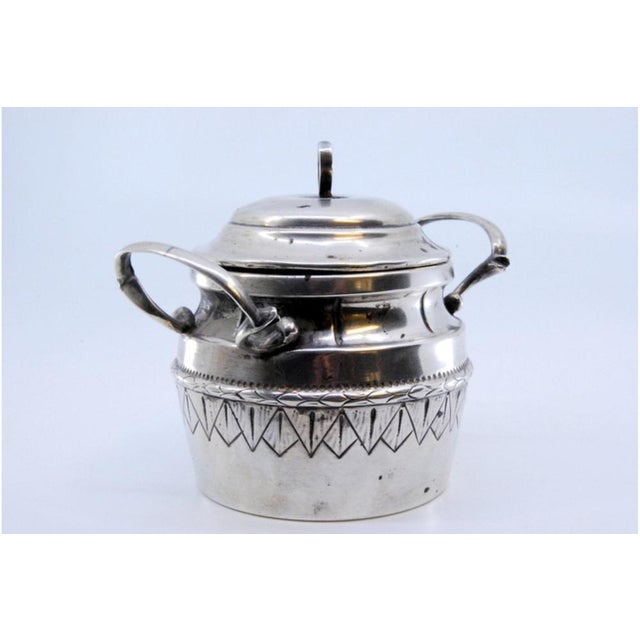 Silver Sugar Bowl with Frieze, Edge Engravings and Lid with Knob, in Very Good conditions. Designed 1890 to 1919 This...