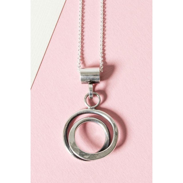 Lovely silver pendant by Cecilia Johansson in a circular, spiraling design. Easy to wear and expressive. Weight 14 grams.