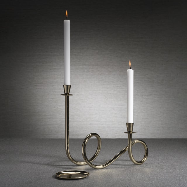 The Breda 2-Tier Brass Candle Holder seamlessly blends modern elegance with practical design. Made of brass and aluminum,...