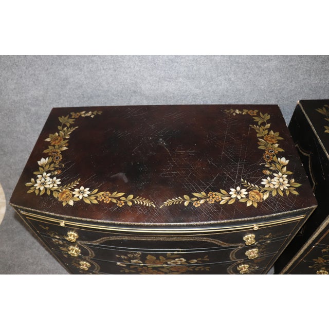 This elegant pair of Baker Chinoiserie painted commodes embodies the timeless sophistication of eighteenth-century French...