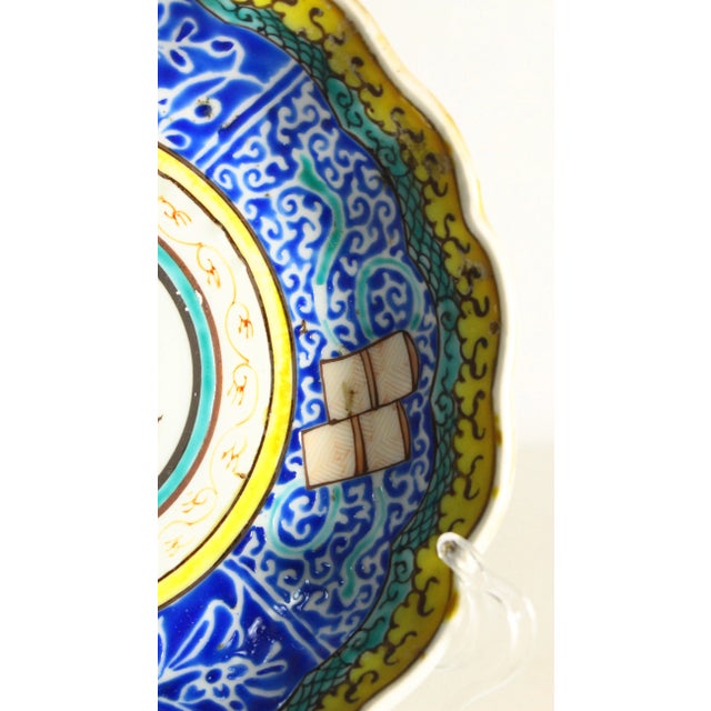A beautiful and rare Chinese export porcelain piece A shallow bowl or deeper plate, exquisitely hand painted with...