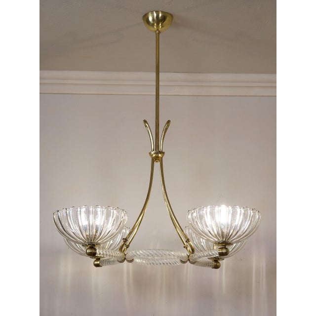 An elegant Venetian vintage Murano glass chandelier dating back to the 1950s and attributed to the renowned Barovier &...