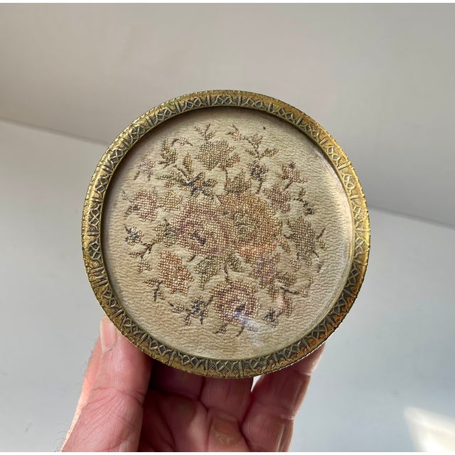 A Danish or English late 19th century early 20th century dresser jar or trinket executed in gilt brass and with a lid...