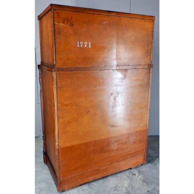 An elegant curved front graces our flame Mahogany chest on chest. It is accented with bronze hardware on the dove-tailed...