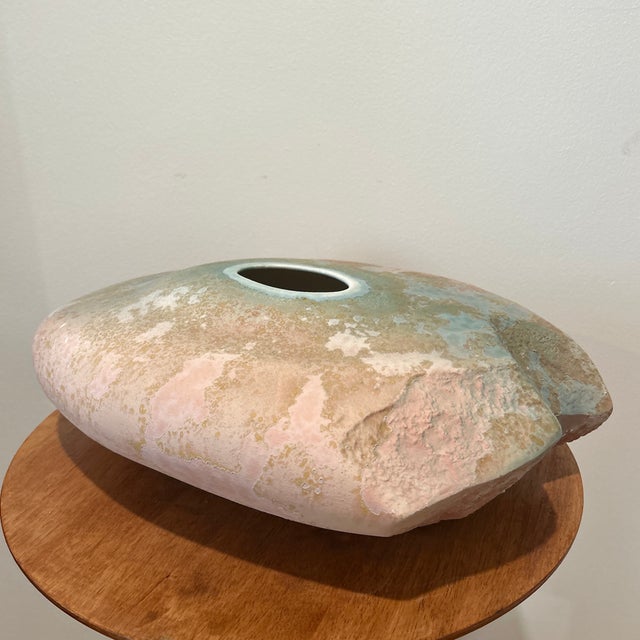 The Vintage Tony Evans "Ancient Sands" Raku Vase is a unique handmade piece with an organic freeform shape, perfect for...