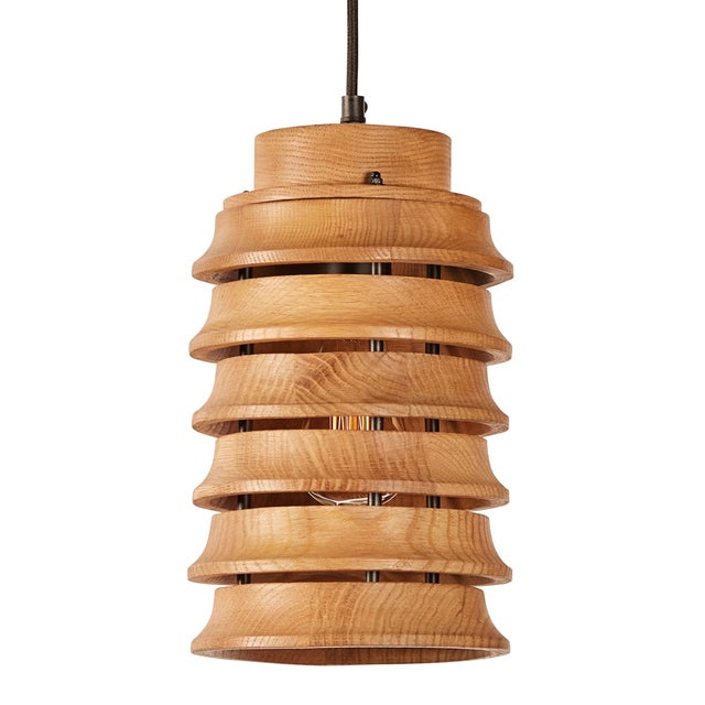 Uniquely designed small oak wood pendant light. Harkens to the lanterns of Japan. Hard-wire fabric cord included.