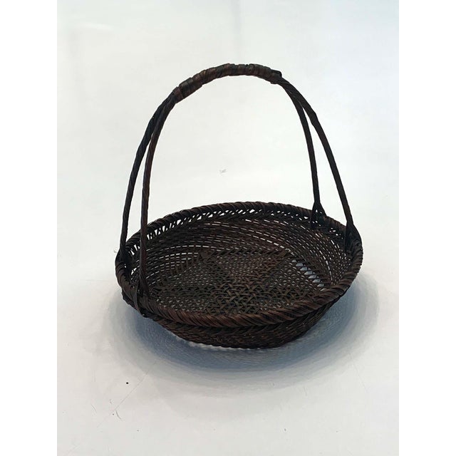 A miniature bamboo basket woven by Hayakawa Shokosai I (1815-1897) circa 1885, an important example of the work by the...