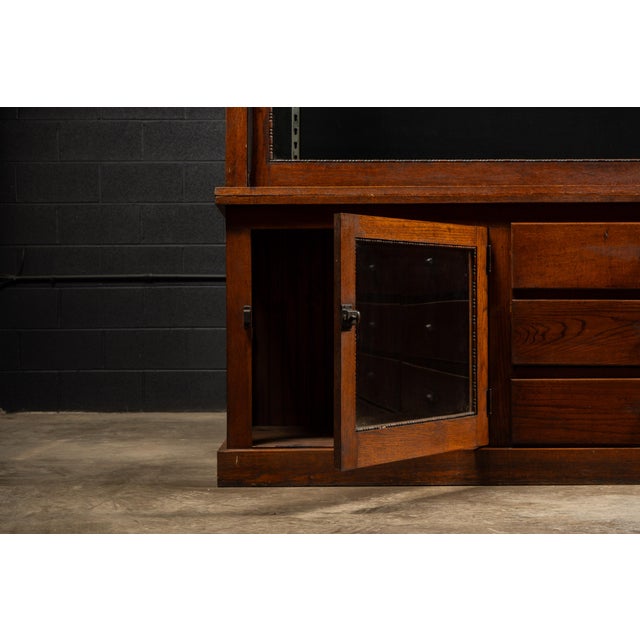 Early 20th Century Antique Oak Mercantile Cabinet With Japanned Copper Hardware For Sale - Image 5 of 10