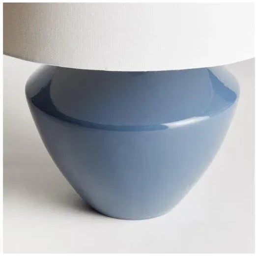 This handsome lamp has a classic silhouette. The body was crated from a centuries old wooden mold. We brought it back to...