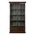 Tall glazed doors and a stepped crown give the display case its architectural presence. A pair of full-height glazed doors...