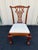 A set of ten Chippendale style mahogany dining room chairs with ball and claw feet. High quality design styled after...
