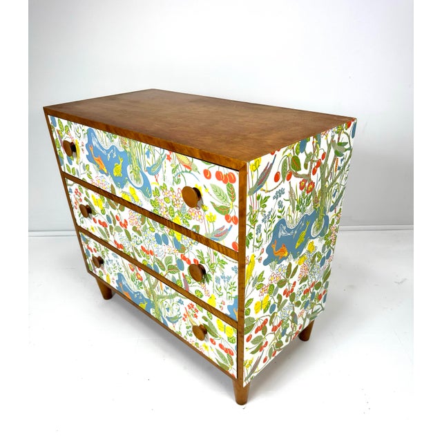 1950’s Swedish three drawer dresser. Dresser later papered in “Paradiset” designed by Josef Frank. Paper originally...
