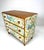 1950’s Swedish three drawer dresser. Dresser later papered in “Paradiset” designed by Josef Frank. Paper originally...