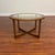 Beautiful round teak coffee table with glass top insert, made in Scotland by A.H. McIntosh in 1971. It's a very cool,...