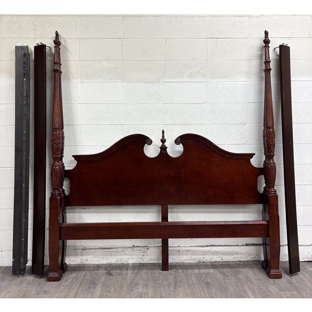 This is an absolutely stunning vintage Universal Furniture Chippendale King-sized carved four poster rice bed, appears to...
