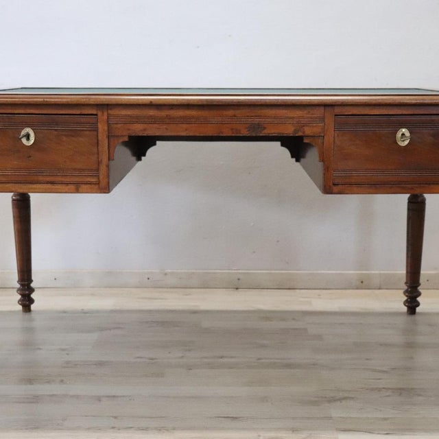 We present this elegant Italian solid walnut desk dating back to the mid-19th century, during the Louis-Philippe period....