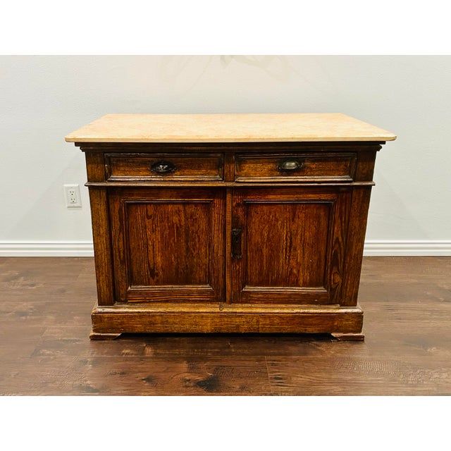 This lovely antique, solid mahogany wood sideboard has a unique and stunning peach with crimson veined marble top, 2...