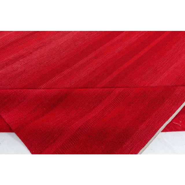 Vintage Swedish Flat Woven Rug Size: 10'0" × 13'0" (304 × 396 cm) This vintage Swedish flat-weave rug is a compelling...