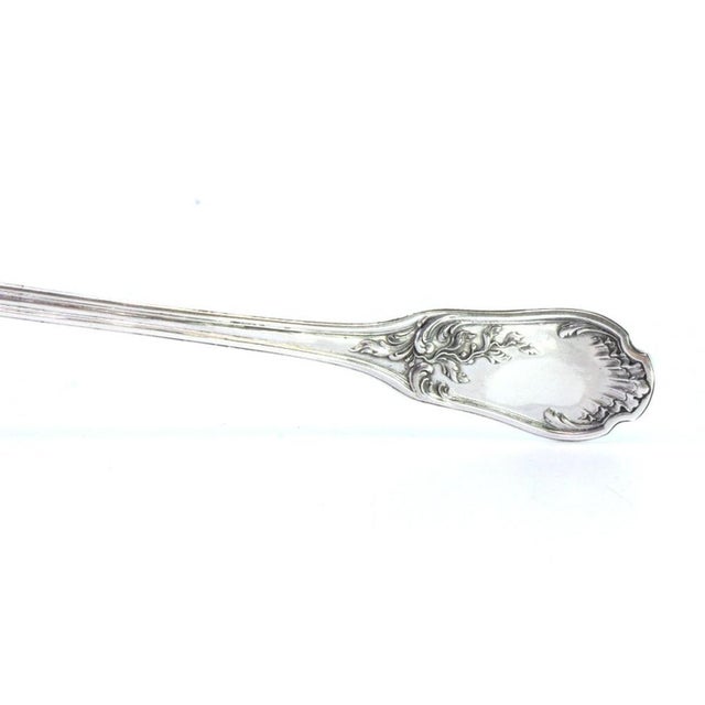 Silver Sauce Spoon with Reliefs and Handle Grooves, in Very Good conditions. Designed before 1890 This piece has an...