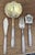 Set of four serving utensils made in France around 1900. French hallmarked with the Minerva for sterling silver, the spoon...