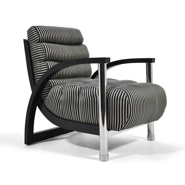 Designed by Jay Spectre for Century, the "Eclipse" lounge chair is a post-modern take on Deco design. Crafted of oak with...