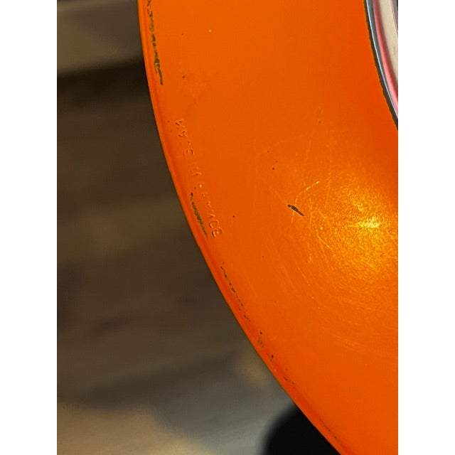 These are vintage Duralex art glass plates from France, featuring a vibrant orange border and a clear or white center....