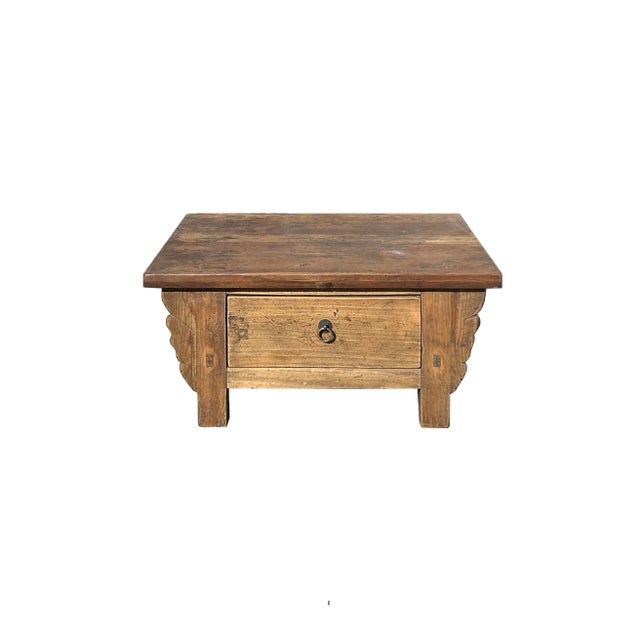 Add a touch of timeworn elegance to your home with this charming vintage-style wooden side table featuring a convenient...