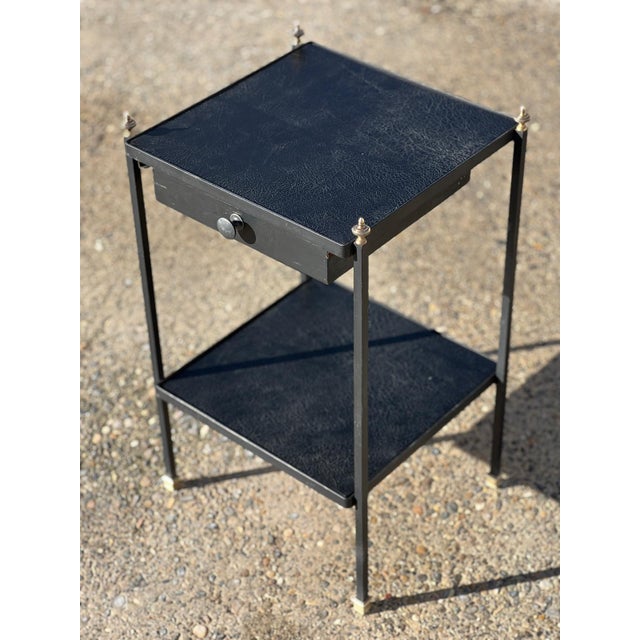 Modernist elegance and minimalism. This side table (or bedside table) is an iconic piece of 1950s French design. Perfectly...