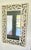 This Neiman Marcus Capiz Shell Mirror is a high-end, handcrafted piece, likely sourced through the luxury retailer's...