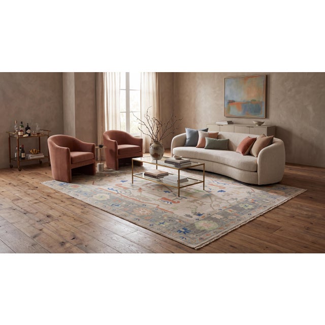Elevate your interior with this exceptionally crafted modern Oushak-style wool rug, designed for sophisticated high-end...