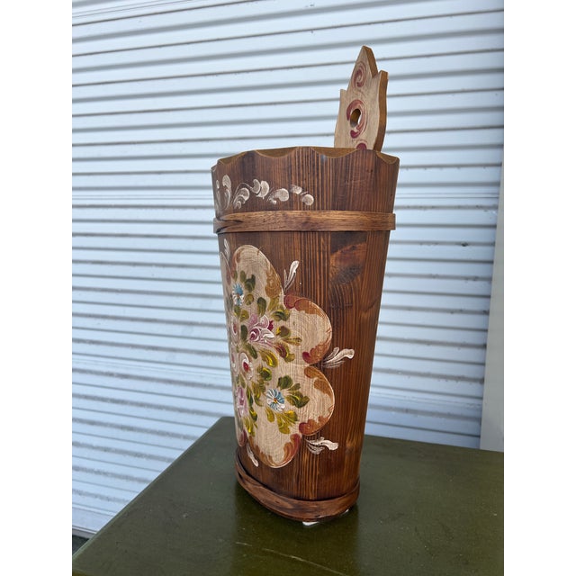 This vintage Bavarian wood umbrella stand showcases traditional German folk art, making it a unique addition to any decor....