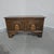 A very smart minature oak coffer with crisp carvings, standing on bracket feet, in excellent overall condition. 17" high...