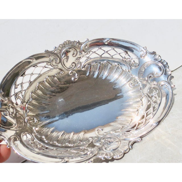 Extremely fine silver dated presentation bowl with a filigree openwork border, fully designed with cartouche centers,...
