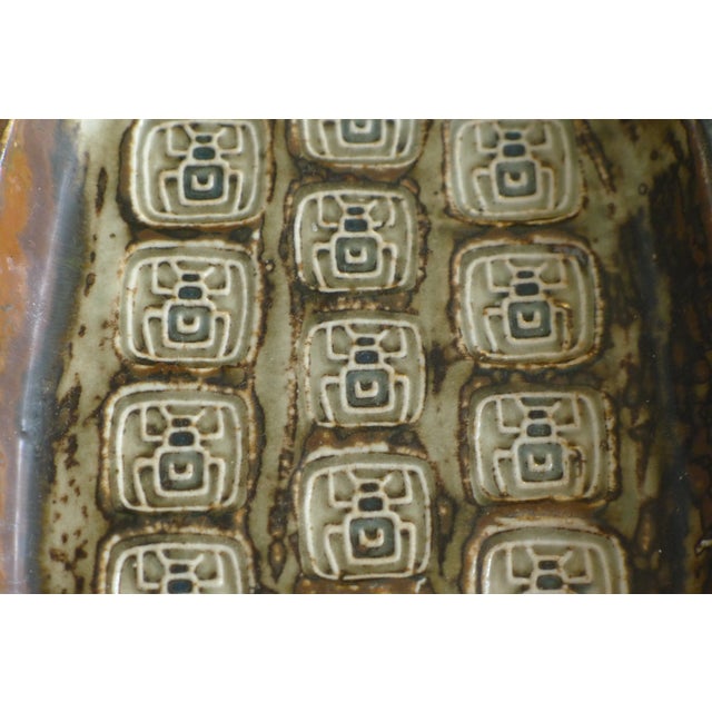 Rectangular stoneware bowl from Royal Copenhagen with embossed motifs. Designed by Jørgen Mogensen in the 1960s. Model...