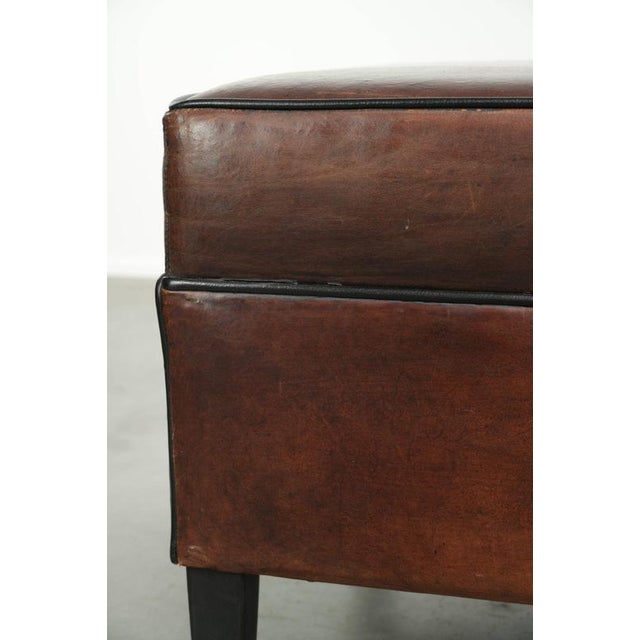 Brown Dark Sheepskin Ottoman with Black Piping For Sale - Image 8 of 10