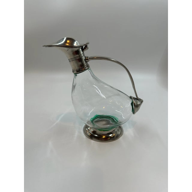 Very beautiful carafe, pitcher, jug, in crystal and engraved pewter.9 Ideal for decanting and serving wine or liquor. The...