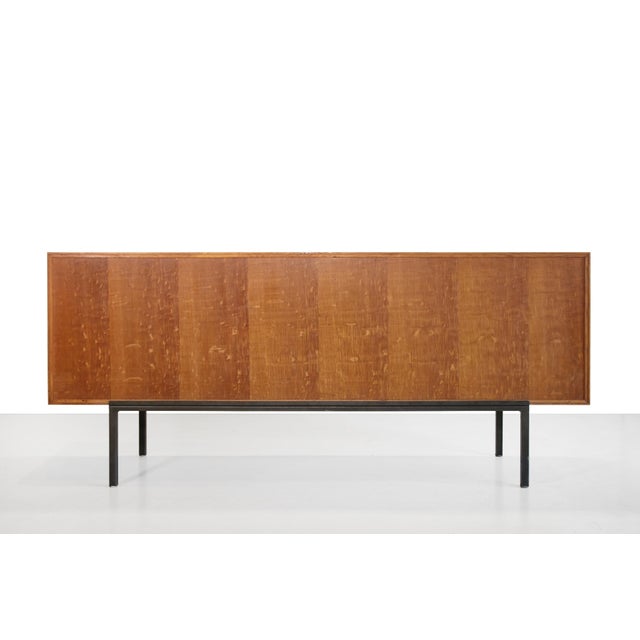 Beautifully refined oak sideboard from France. The cabinet is marked with a sticker from the Federation Nationale de...